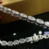 Oval Cut Bezel Tennis Bracelet | Secure & Stylish 10 Ct Oval Cut Bezel Tennis Bracelet East west lab grown moissanite classic secure clasp line bracelets for her 10 year anniversary