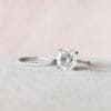 2 Ct Elongated Cushion Cut Engagement Ring Set with a hidden halo and a matching micro-pavé wedding band.