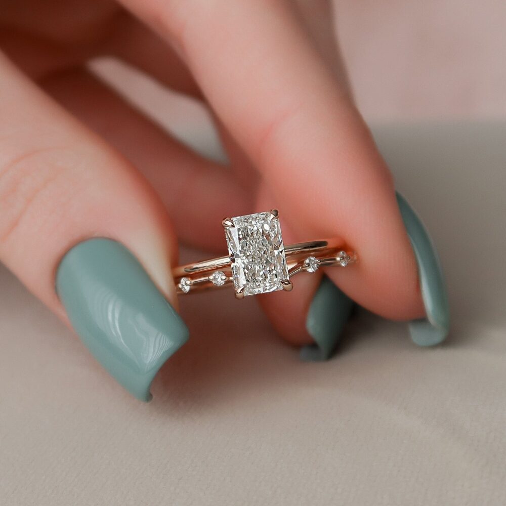 2 carat radiant cut moissanite engagement ring set with hidden halo, crafted in 14K rose gold for women