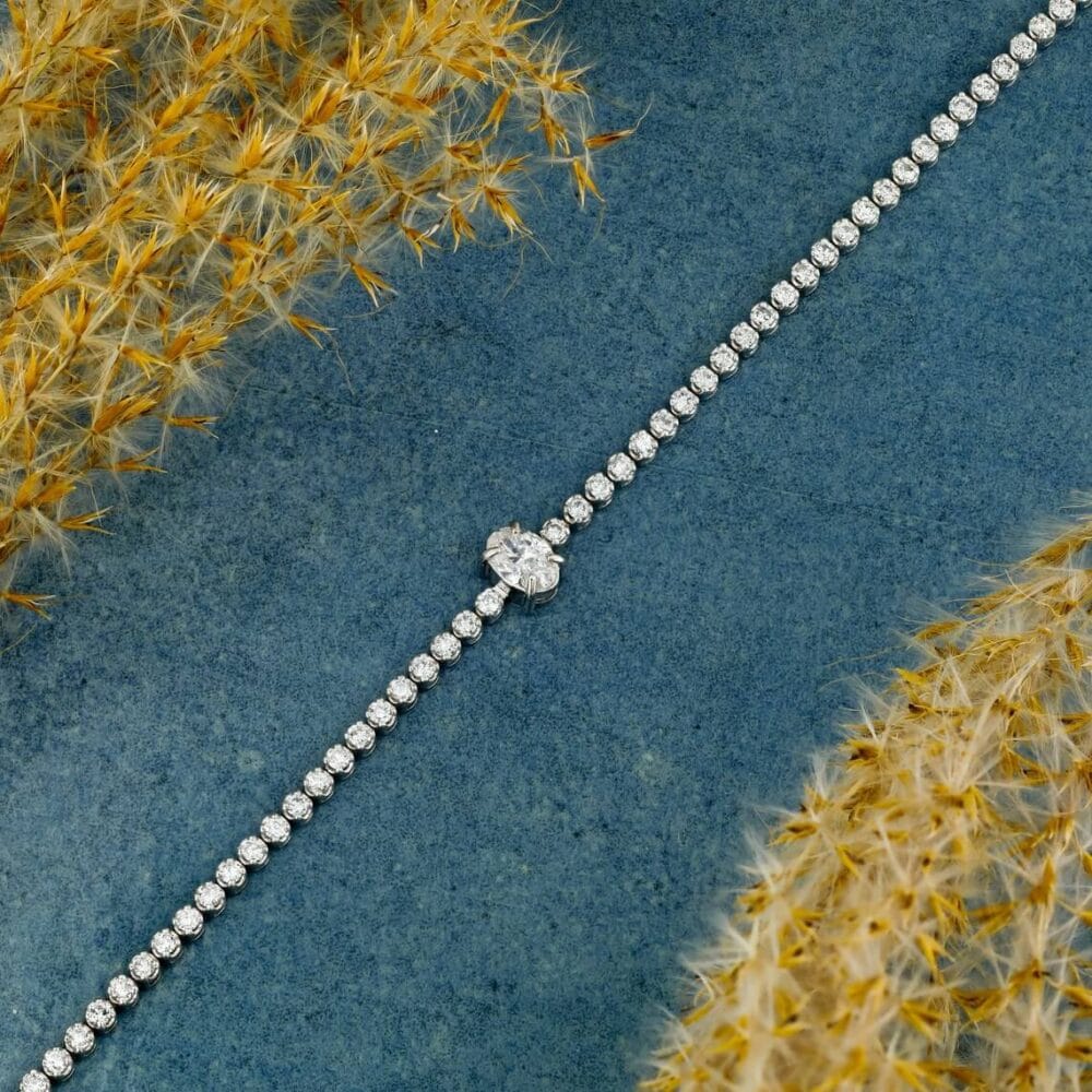 2.5 Ct Diamond Tennis Bracelet in 14K Gold Studded With Moissanite this Exclusive 14k Gold bracelet have oval center diamond