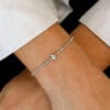 2.5 Ct Diamond Tennis Bracelet in 14K Gold Studded With Moissanite this Exclusive 14k Gold bracelet have oval center diamond wearing in hand