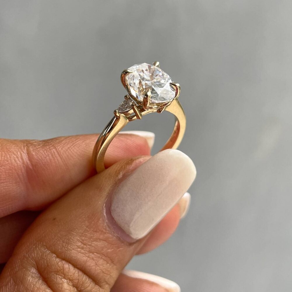 Oval Three Stone Engagement Rings