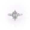 3 carat moissanite marquise ring White gold angled side view showing elongated boat-shaped centre stone and pear side stones