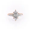 3 carat moissanite marquise ring in rose gold with pear and round cluster side stones