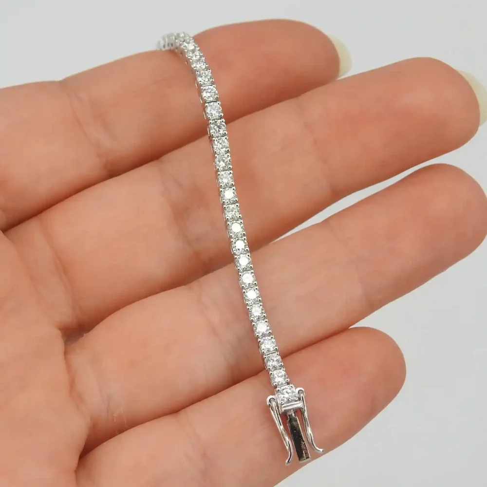 3Ct Moissanite Tennis Bracelet Crafted in Gold and Platinum - Fine round diamond line bracelet with secure lock bracelet in wrist