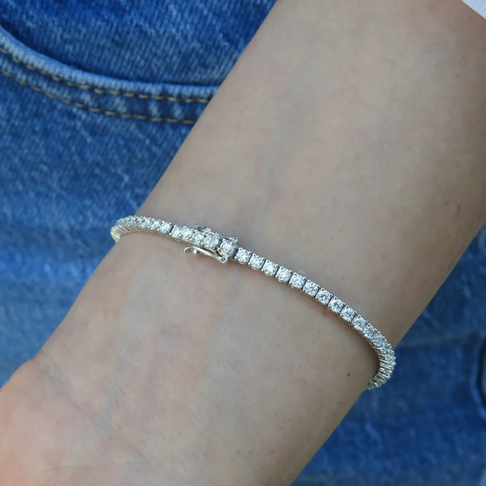 3Ct Moissanite Tennis Bracelet Crafted in Gold and Platinum - Fine round diamond line bracelet with secure lock bracelet in wrist