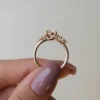 4 ct round diamond engagement ring in white gold front view showing round brilliant moissanite centre and symmetrical side stone clusters