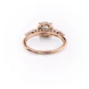 4 ct round diamond engagement ring in white gold front view showing round brilliant moissanite centre and symmetrical side stone clusters