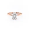 The Seraphina | Hidden Halo Oval Moissanite Engagement Ring A romantic 18K rose gold hidden halo oval moissanite engagement ring