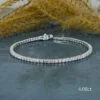 A stunning 3 Ct Moissanite tennis bracelet adorned with sparkling diamonds, showcasing elegance and luxury