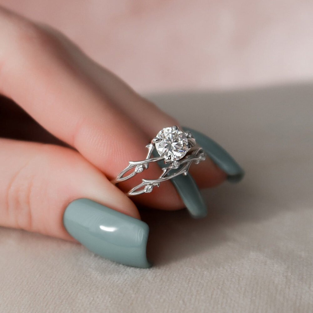 Bridal wedding ring set featuring a round moissanite engagement ring with nature-inspired design in 14K pure gold Nature Inspired Wedding Rings Sets