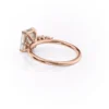 Classic emerald cut engagement ring in yellow gold — rear view showing slim polished band and open basket setting