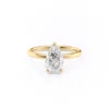 Hidden Halo Pear Engagement Ring crafted in Yellow gold