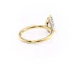 Hidden Halo Pear Engagement Ring crafted in Yellow gold