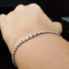 Luxury Graduated Moissanite tennis bracelet crafted in 14K gold