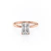 The Elara | Emerald Cut Moissanite Engagement Ring with Hidden Halo Romantic 18K rose gold emerald cut engagement ring with a subtle hidden halo