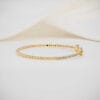 Half Diamond Beaded Bangle Bracelet Crafted in 14k Gold For Women This Half Diamond Beaded Bangle Bracelet, crafted in 14K gold, offers a traditional design with modern elegance