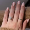 Vintage Emerald Engagement Ring in a Solitaire Petal Prong Setting Vintage Emerald Engagement Ring in a Solitaire Petal Prong Setting in 18k And 14K Gold. Perfect for gifts