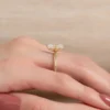Vintage Emerald Engagement Ring in a Solitaire Petal Prong Setting Vintage Emerald Engagement Ring in a Solitaire Petal Prong Setting in 18k And 14K Gold. Perfect for gifts