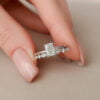 moissanite Bridal set featuring 1ct elongated radiant cut engagement ring and wedding band with hidden halo