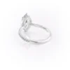 Sparkling marquise cut moissanite engagement ring with hidden halo.