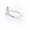Sparkling marquise cut moissanite engagement ring with hidden halo.