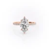 Sparkling marquise cut moissanite engagement ring with hidden halo.