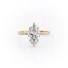 Sparkling marquise cut moissanite engagement ring with hidden halo.