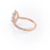 Sparkling marquise cut moissanite engagement ring with hidden halo.
