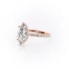 Sparkling marquise cut moissanite engagement ring with hidden halo.