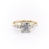 three stone moissanite engagement ring gold