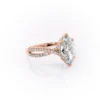 Sparkling yellow gold marquise diamond engagement ring with twisted band.