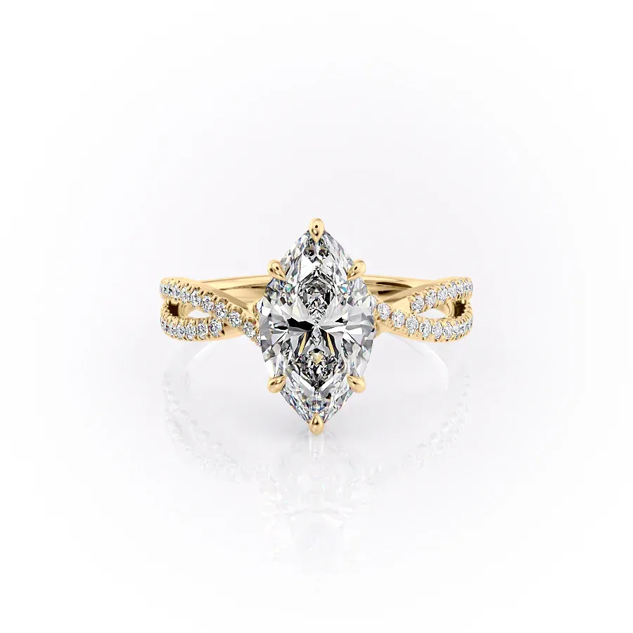 Sparkling yellow gold marquise diamond engagement ring with twisted band.