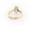 Sparkling yellow gold marquise diamond engagement ring with twisted band.