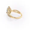 Sparkling yellow gold marquise diamond engagement ring with twisted band.